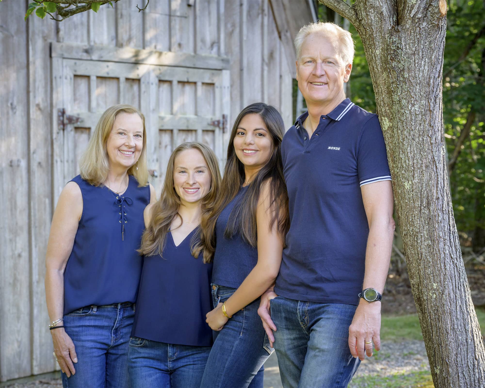family photo in their backyard on cape cod