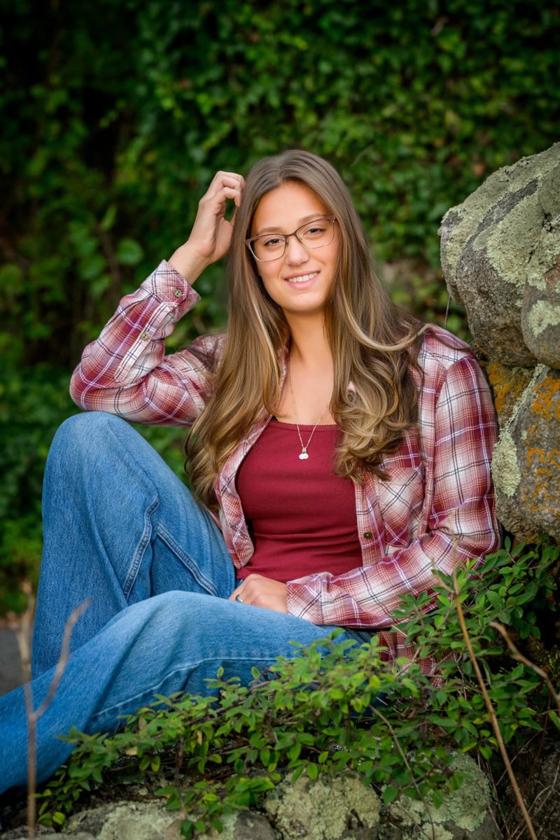 high school senior girl posing in a park for her senior pictures in bourne, ma
